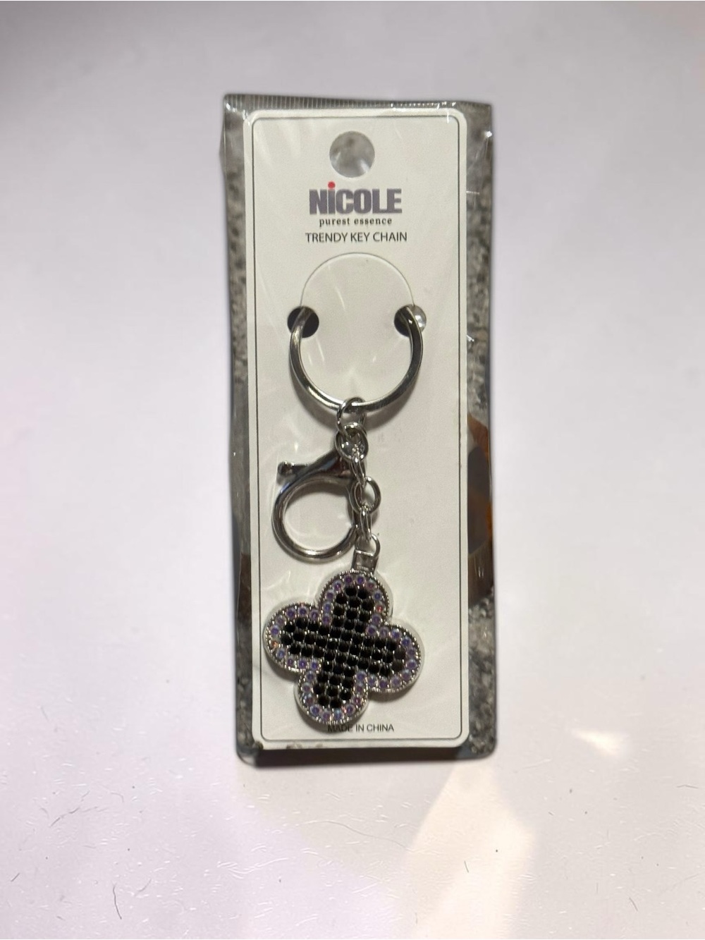 Nicole Purple and Black Clover Keychain with Silver Hardware